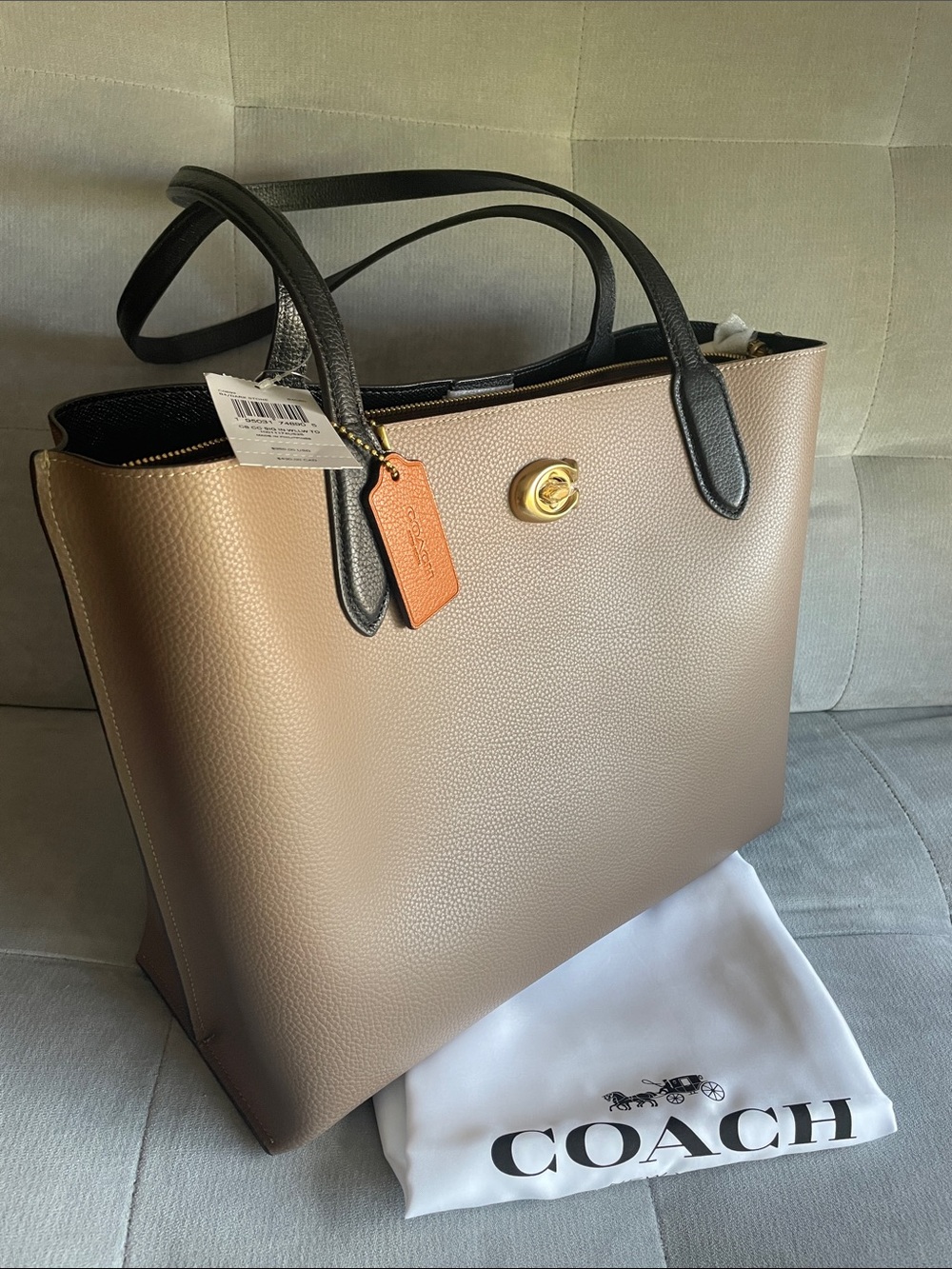 Coach Taupe Tote with Black Handles and Tan Tag, large monogram interior pocket